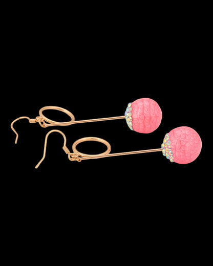 Boucles d’oreilles dorées pierres roses pendantes