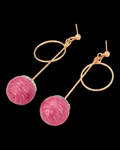 Boucles d’oreilles dorées pierres roses pendantes